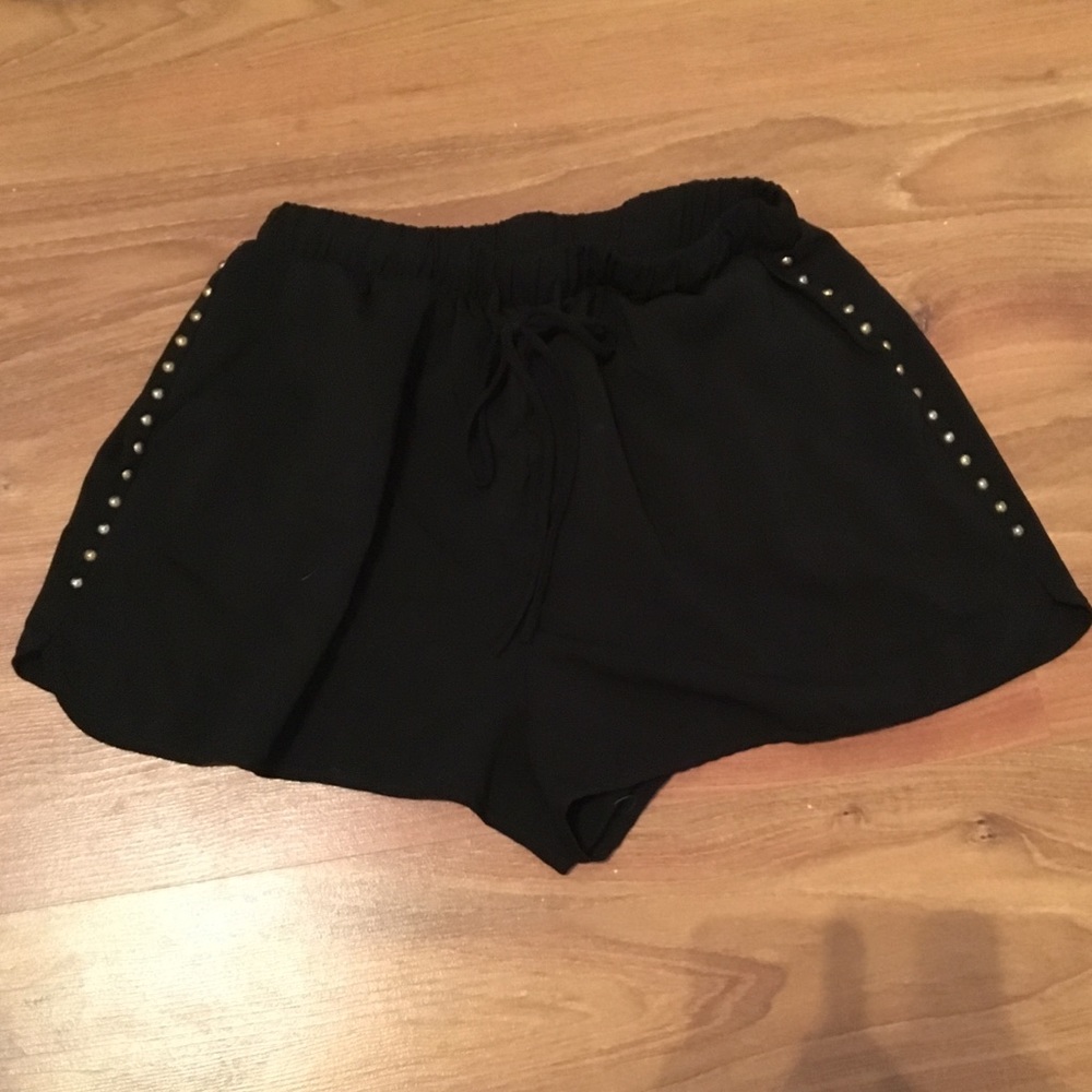 Side studded black shorts